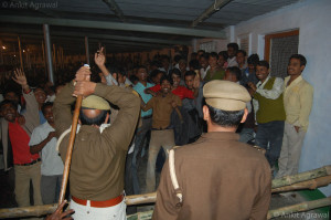 Police canning unruly male students in Spandan 2009