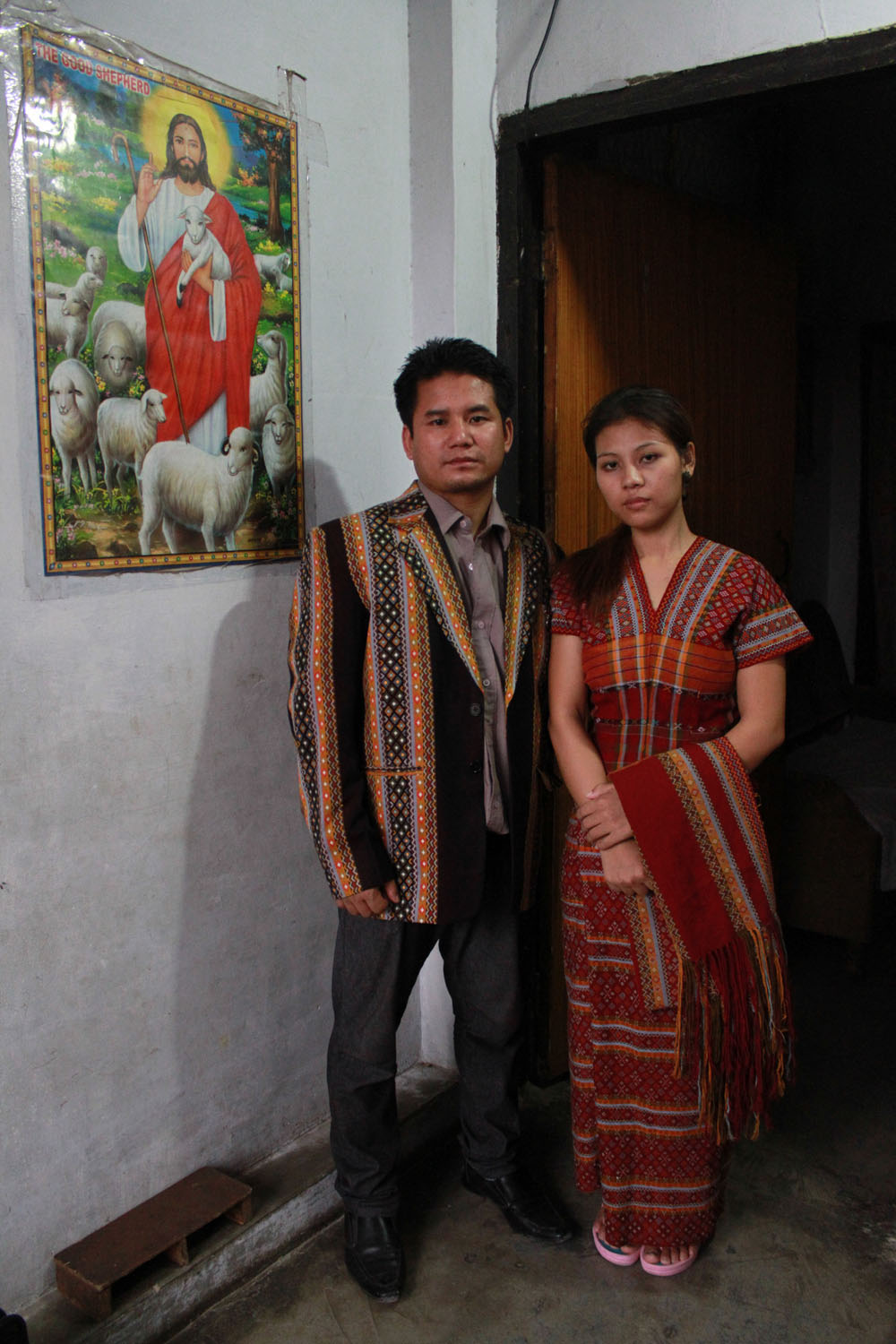 A men and women in traditional attire which will be exported.